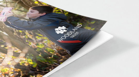 Document cover featuring pupil learning outdoors