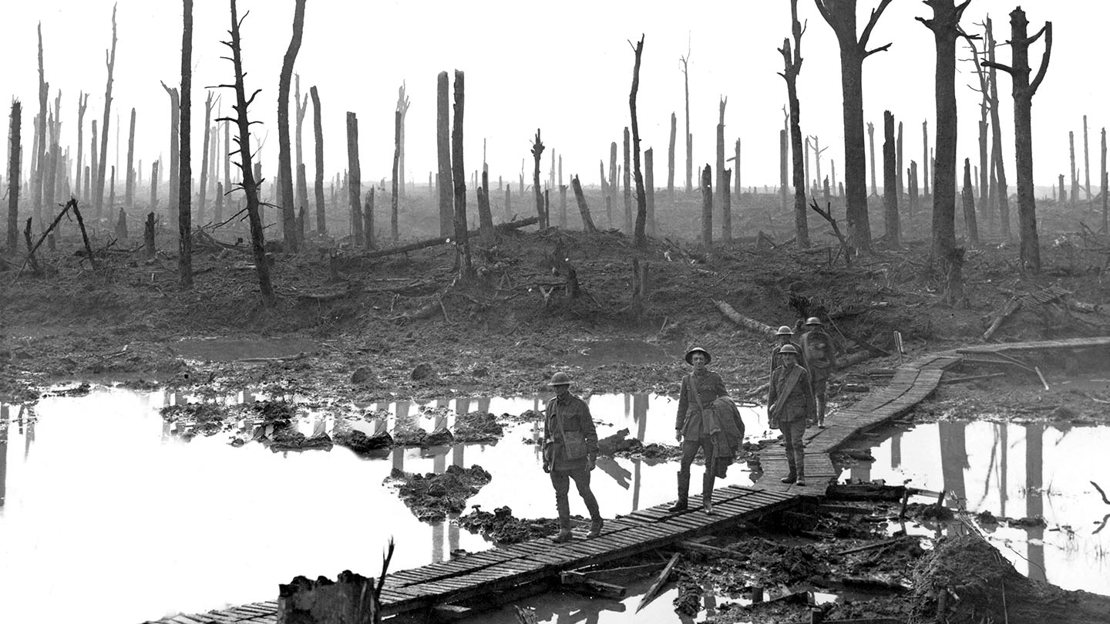 World War One soldiers crossing a bog in a destroyed forest