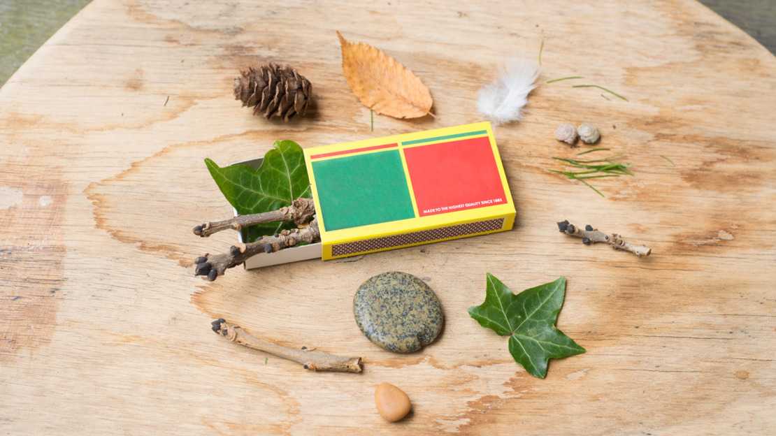 Matchbox scavenger hunt with small natural materials