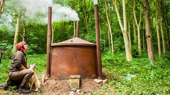 Charcoal kiln in the woods