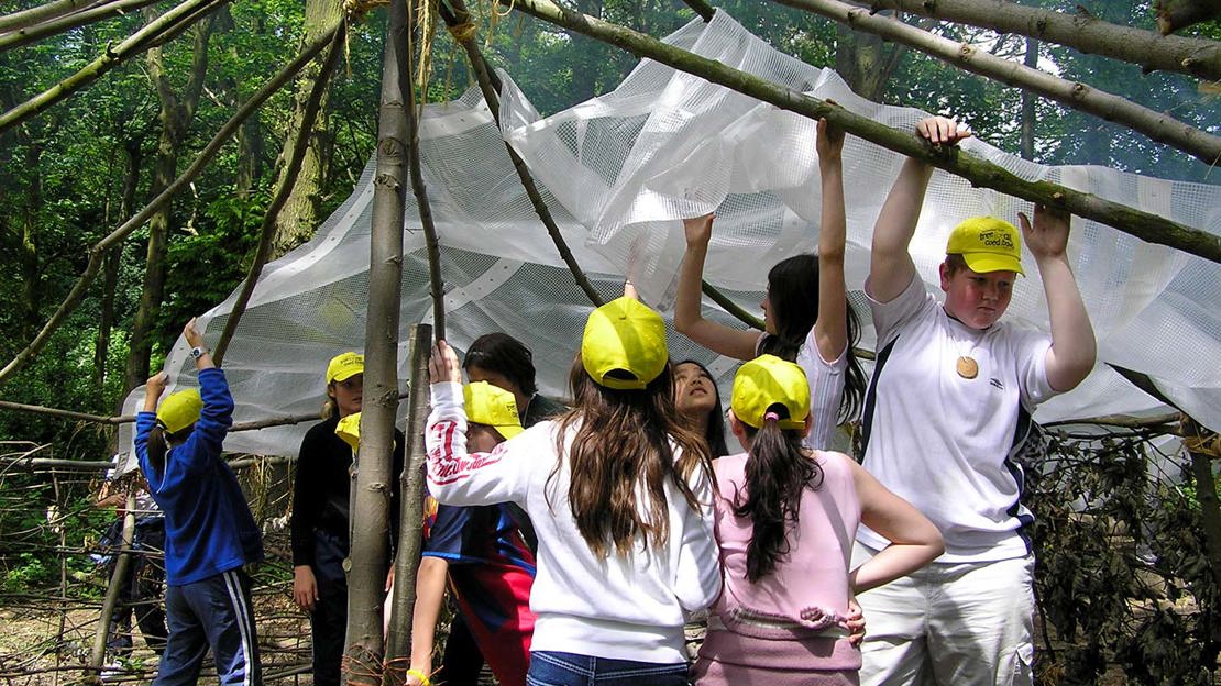 Forest Schools building a hut