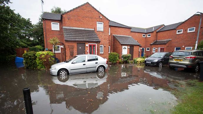 Flash flooding from torrential rain. Storms flooding a housing estate in the coastal town of Rhyl, North Wales.