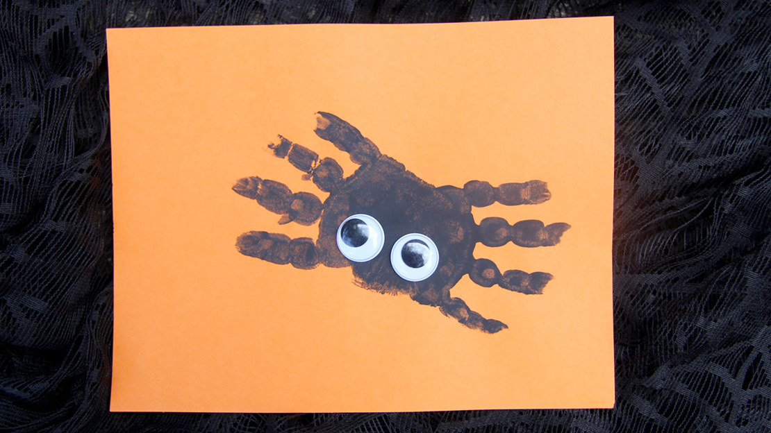 Spider handprint craft with googly eyes