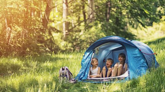 Kids camping in tent
