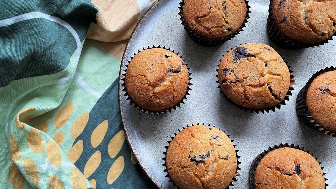 Elderberry and dark chocolate muffins on a plate