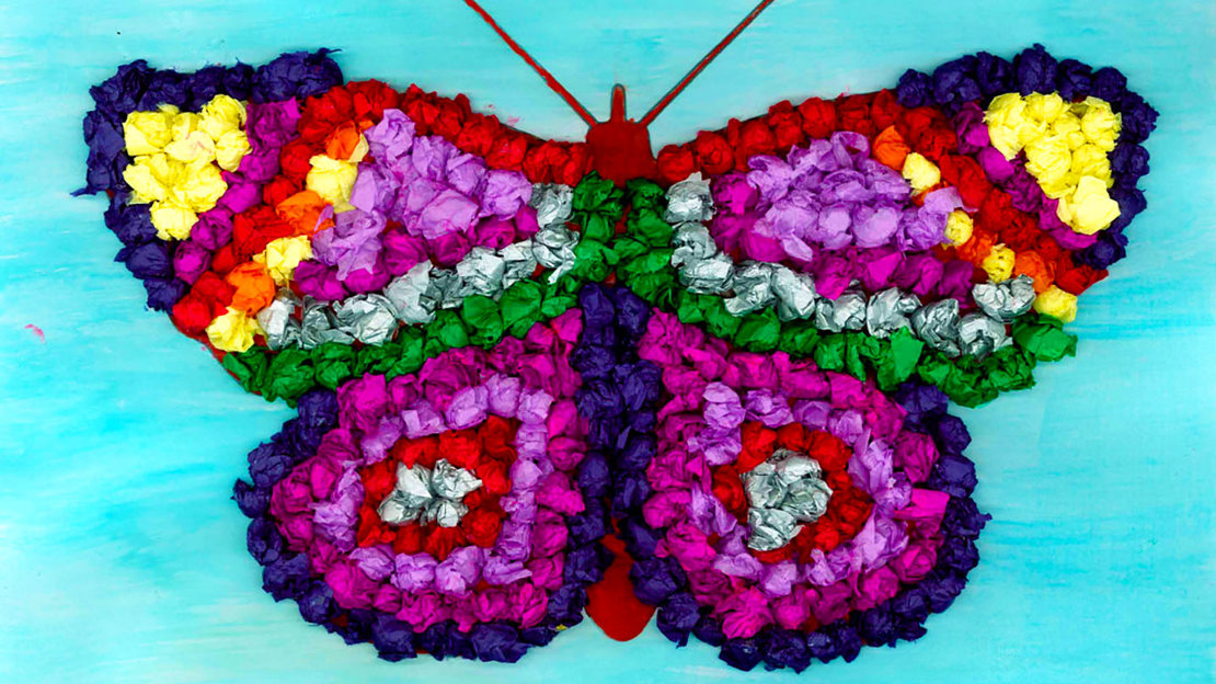 Butterfly collage made from colourful tissue paper balls