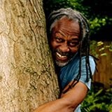 Danny Clarke hugging a tree